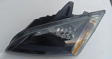FRONT LEFT HEADLIGHT FORD
