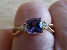 AAA Tanzanite (1.05cts) & White Zircon Ring in 9k  Gold.  New.  Size N-O.  