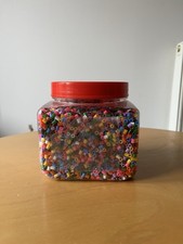 Jar Tub of Plastic beads of