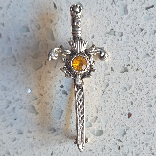 Silver tone metal sword brooch - metal,