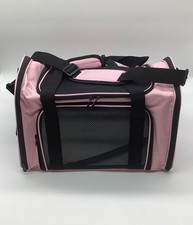 Pink pet carrier. Medium sized