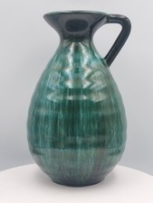 Studio pottery handled water jug in green