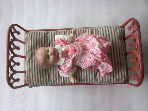 Victorian era cast iron doll - era,