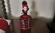 Hand knitted toilet roll doll