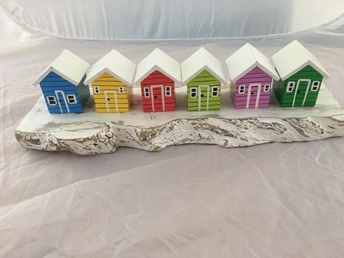 Set beach huts on - huts,