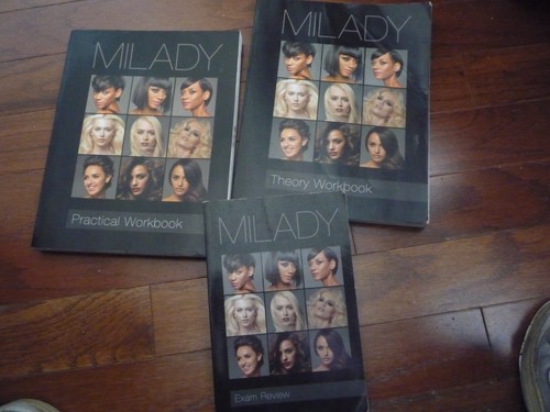 Three milady cosmetology books - milady,