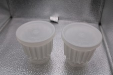 pair of vintage tupperware jelly moulds