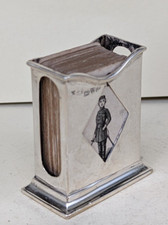 A 1901 sterling silver card deck stand with USA Little Duke deck of cards