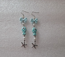Ceramic Fish Starfish Bow Faux