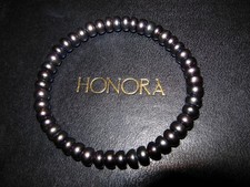 HONORA GLOSSY OIL ON WATER