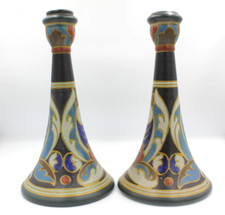 Pair of Gouda Gladys pattern candlesticks, with stylised floral design, H28cm