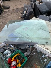 NS PASSENGER REAR DOOR GLASS