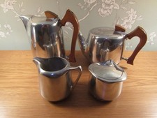 PICQUOT WARE  FOUR PIECE TEASET TEA POT WATER JUG SUGAR BOWL  AND MILK JUG