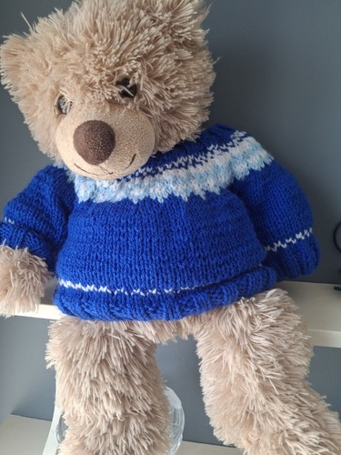 Hand knitted blue fair - hand,