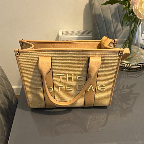 Tan straw leather logo - &,