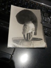 A 1930S  PHOTO OF AN EARLIER ?  LIFE GUARDS HELMET  ?  