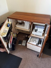 Brother Galaxie ii Embroidery machine + Janome Overlocker, Horn Cabinet package