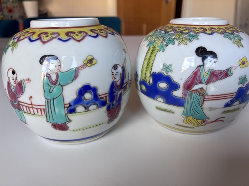 Pair signed hand painted - of,