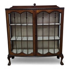 Antique display cabinet - double door design on claw and ball feet - bow front