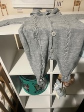 unbradned grey knitted romper 6-9 months good condtton