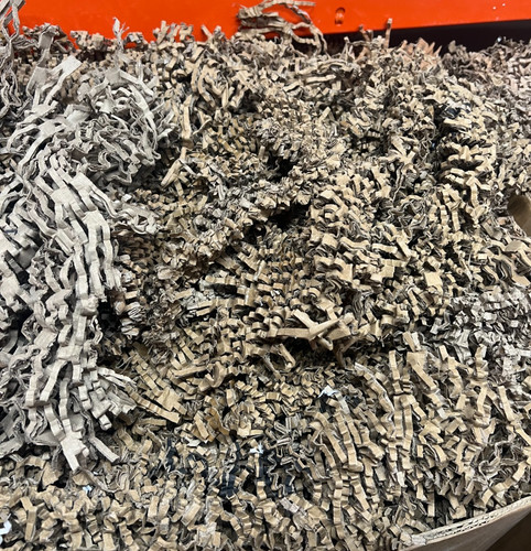 Shredded cardboard packaging - -,