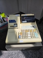 vintage cash register with key