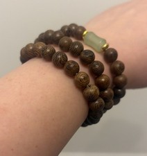 Wooden Buddhist prayer beads, three-strand bracelet, jewelry. 