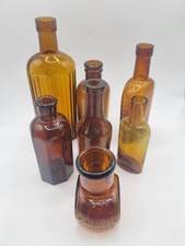 7 Vintage Brown Glass Bottles