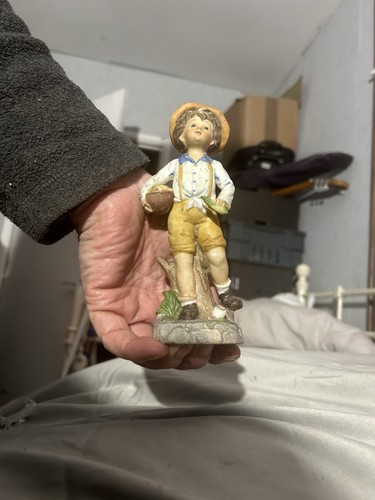 Unmarked boy walking figurine - boy,