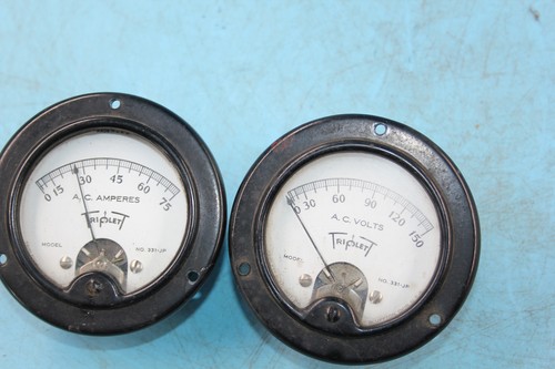 Two vintage triplett - two,