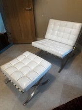 White barcelona chair and