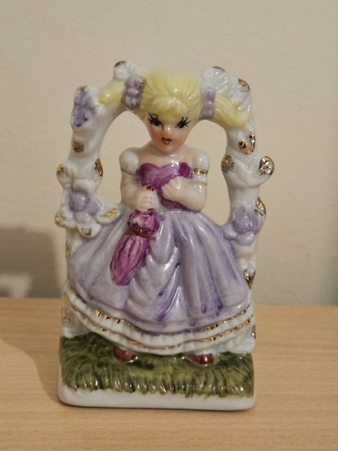 Vintage porcelain girl under - porcelain,