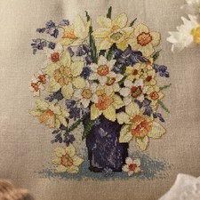 Vase of daffodil and bluebell