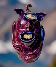 Pottery Purple Face Jug 8”