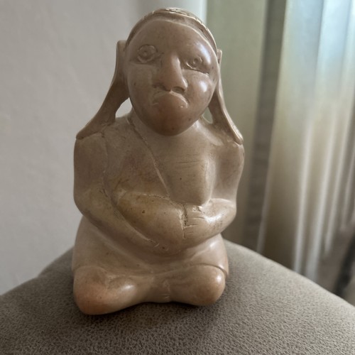 Heavy carved stone sitting - carved,