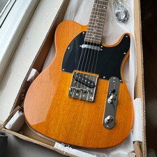 Brown electric guitar chrome