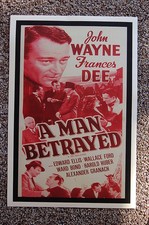A Man Betrayed Lobby Card