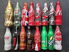 16 collectible limited edition Coke Sprite aluminium and glass bottles JOB LOT 