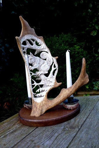 Candlestick holder made - , from