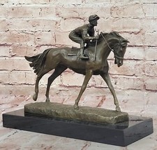 JOCKEY RIDING HORSE BRONZE