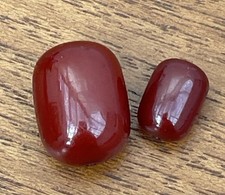 2 Small Cherry Amber Bakelite Barrel Beads Internal Streaking