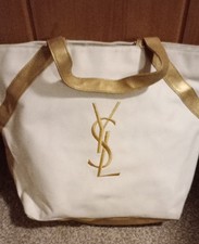 YSL Parfums gold and cream