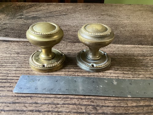 Pair brass rope design - of,