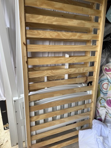 White bunk beds with - bunk,