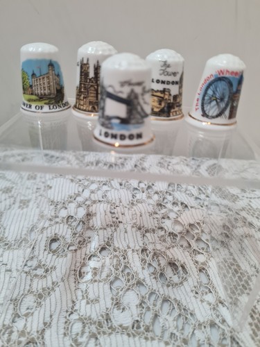 Thimbles depicting iconic - 5,