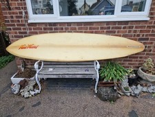 New Waves windsurfing board - yellow/orange used without sail or fins