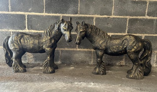 Pair cast iron horses - of,