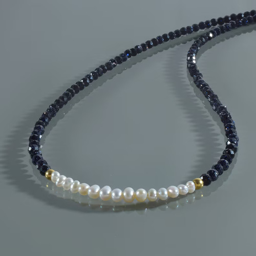 Handmade sandstone pearl - &,