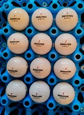 12 BRIDGESTONE E 6 WHITE GOLF BALLS ( OLDER EDITION ) { MARKING MATCHED }
