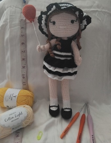 Amigurumi doll holding - doll,